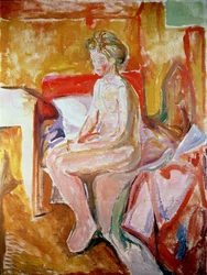 Fille assise au bord de son lit